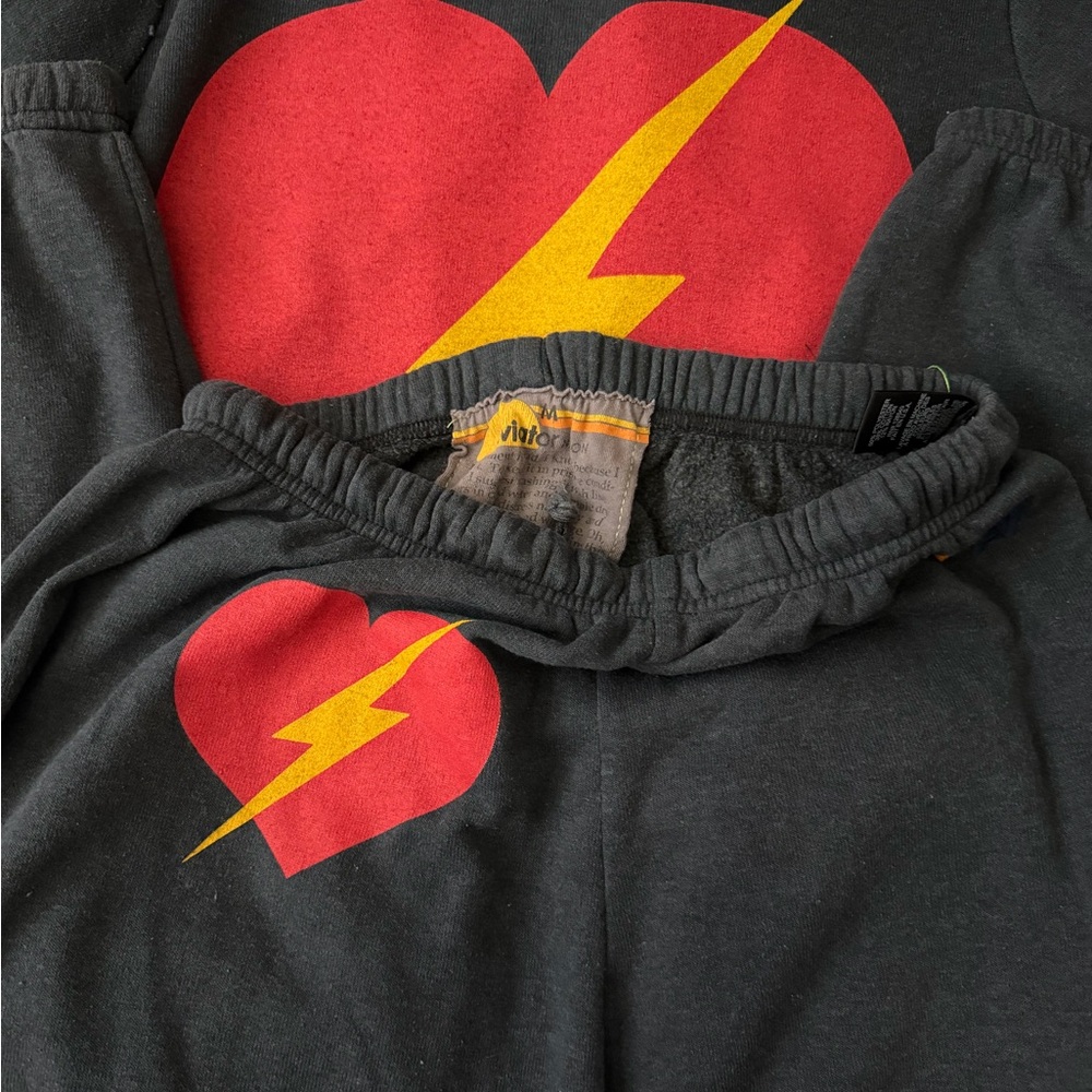 Aviator Nation Black Track Pants with Red Heart & Yellow Lightning Graphic